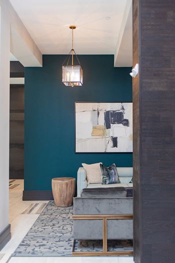 A living room with a blue wall